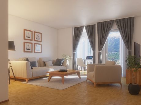 Inneneinrichtung einer Wohnung mit Couch und Fenster